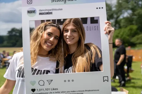 Teachers with Instagram frame prop